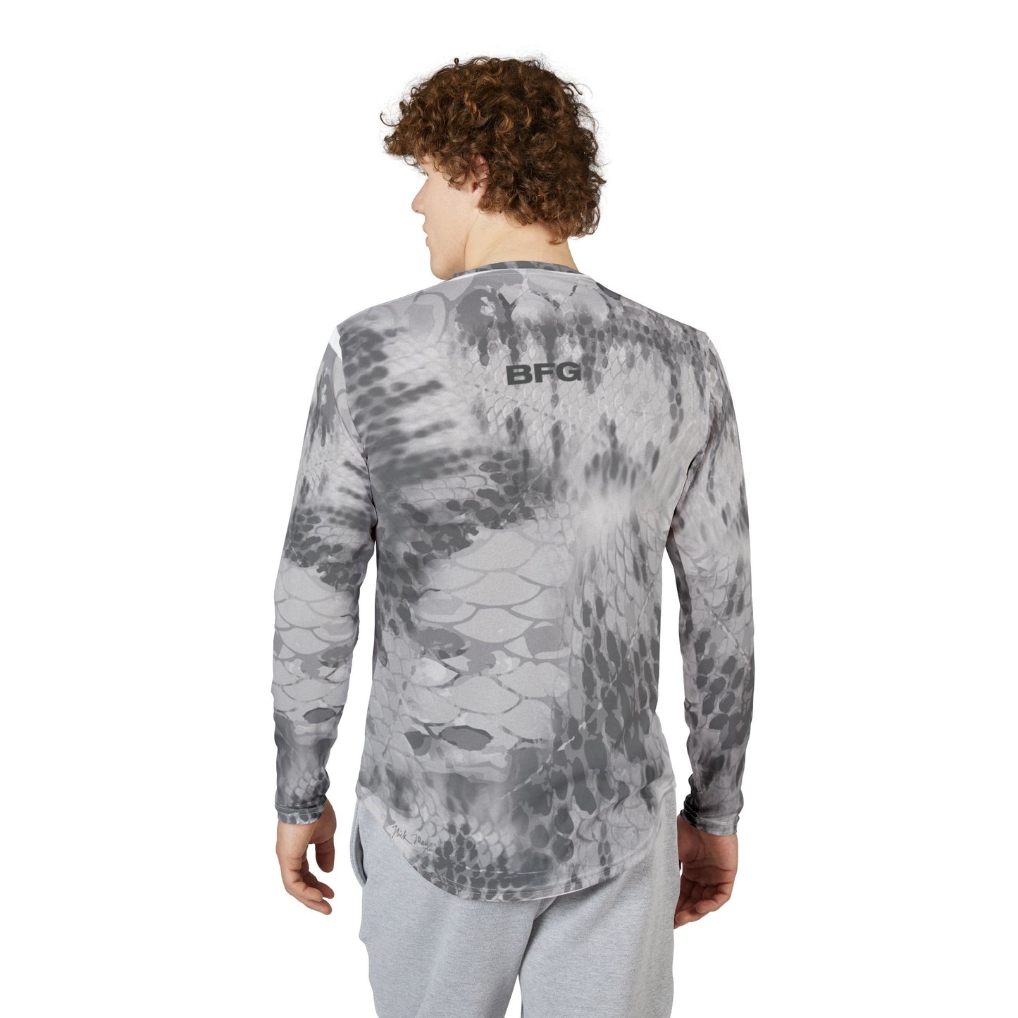 A man wearing a gray long sleeve fishing shirt - back
